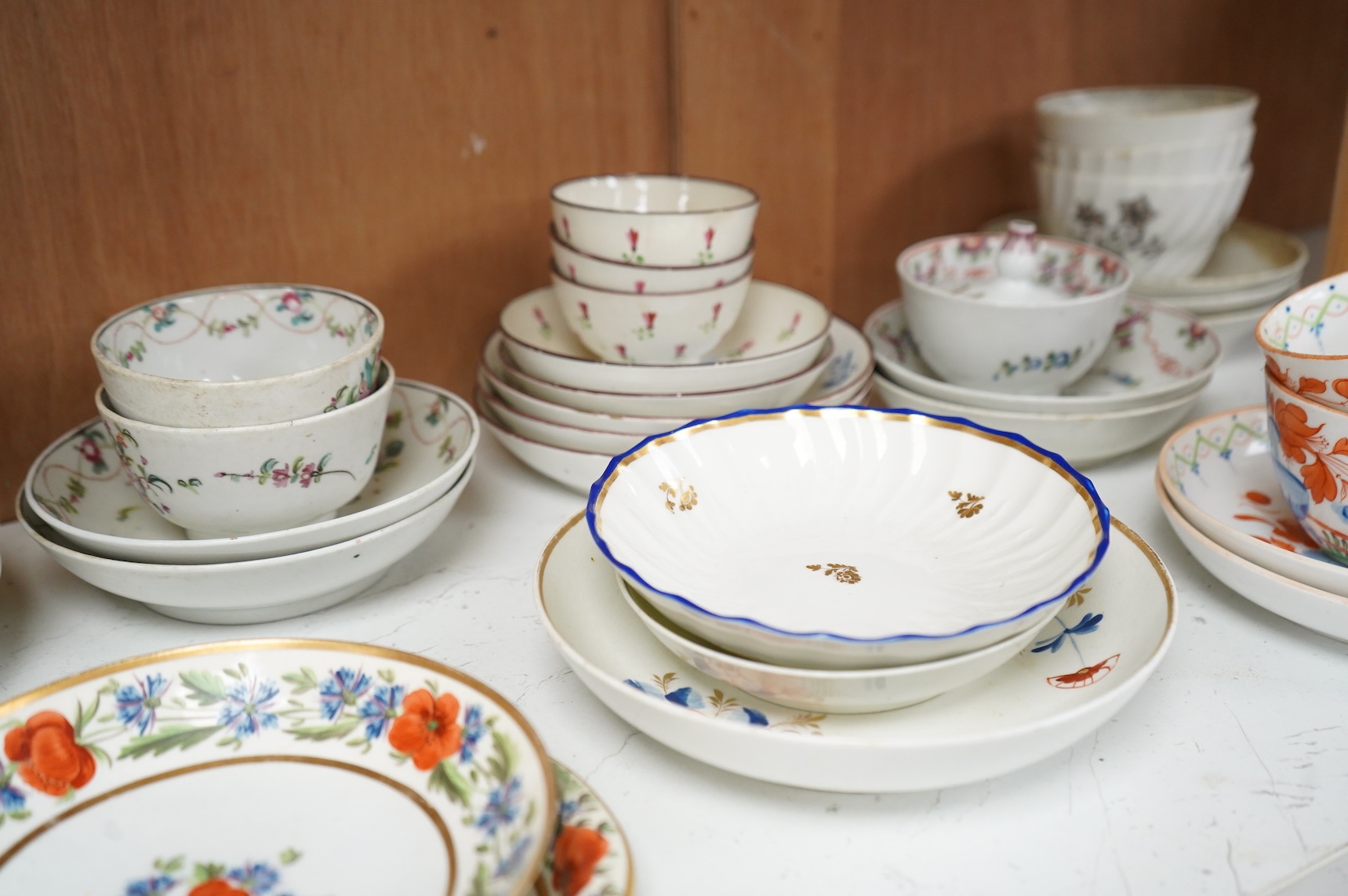 A collection of late 18th/early 19th century and later teawares to include Derby and Worcester with Flight mark